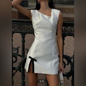 Asymmetrical bow dress
